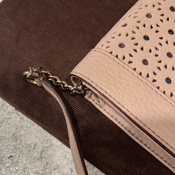 Kate Spade clutch in a taupe leather with laser cutout design. - Picture 3 of 5
